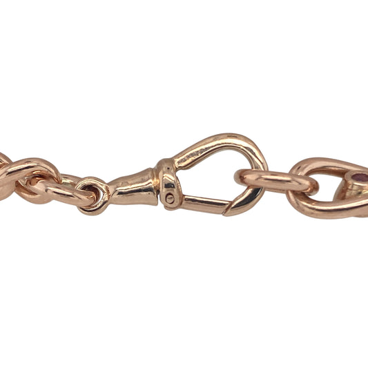 Bring vintage charm and rich colour to your collection with this pre-owned 9ct rose gold and amethyst set Figaro bracelet, a bold design with timeless elegance.

Design: The bracelet features a classic Figaro link pattern, each 7mm wide, enhanced with vintage styling and accented by amethyst stones for a distinctive finish.
Material: Made from 9-carat rose gold, the warm tone complements the deep purple of the amethysts, adding sophistication and character.