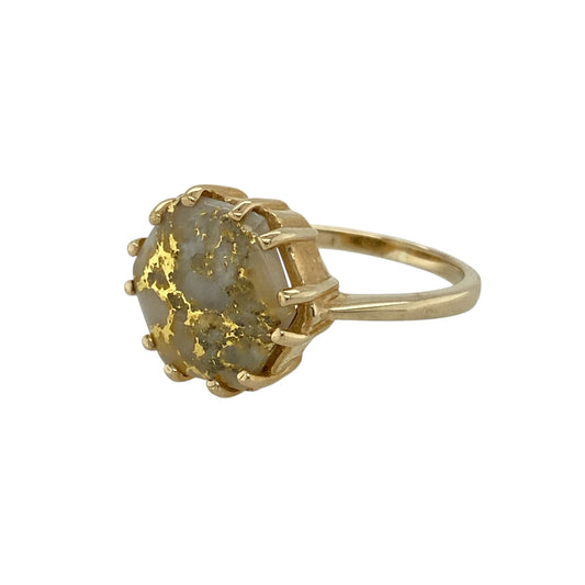 Bring unique character and bold style to your collection with this pre-owned 9ct yellow gold rutilated quartz nugget ring—a striking design that highlights the natural beauty of the gemstone.

Design: The ring features an 11mm by 13mm hexagon-shaped rutilated quartz, framed in a textured nugget-style setting that enhances the stone’s golden inclusions and organic appeal.
Material: Made from 9-carat yellow gold with rutilated quartz, the polished and textured surfaces combine to create contrast and depth.