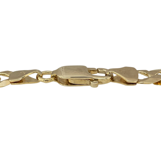 Bring bold style and timeless design to your collection with this pre-owned 9ct yellow gold curb bracelet—a substantial piece with classic appeal.

Design: The bracelet features an 8.5-inch curb chain with 7mm wide links, offering a strong and distinctive look.
Material: Made from 9-carat yellow gold, the polished finish enhances the shine and rich golden tone of the links.