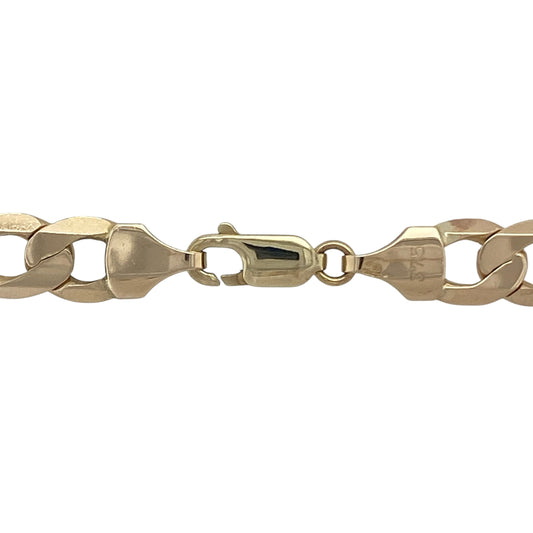 Bring bold presence and timeless style to your collection with this pre-owned 9ct yellow gold curb chain—a substantial design with classic appeal.

Design: The chain features a 20-inch length with 7mm wide curb links, offering a strong and distinctive look.
Material: Made from 9-carat yellow gold, the polished finish enhances the shine and rich golden tone of the links.
Necklace Detail: With its solid weight and wide links, this chain makes a standout statement when worn alone or layered with other pieces.

