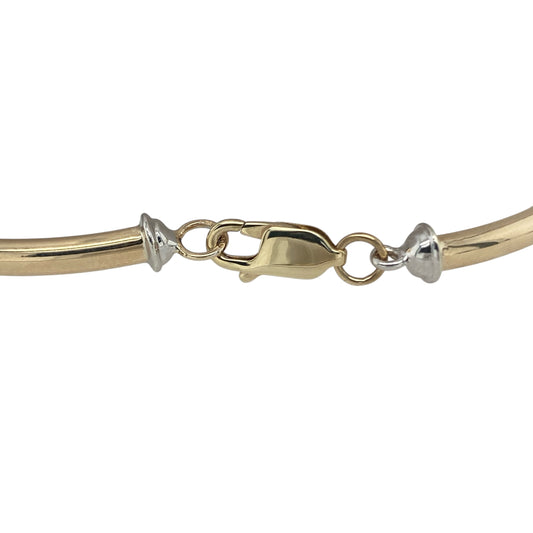 Bring playful sparkle and elegant detail to your collection with this pre-owned 9ct yellow and white gold diamond charm bracelet, a stylish piece full of meaning and charm.

Design: The bracelet measures 7 inches in length and features four charms—a flower, star, heart, and horseshoe—each accented with sparkling diamonds.
Material: Made from 9-carat yellow and white gold, the polished two-tone finish adds contrast and enhances the brilliance of the diamonds.