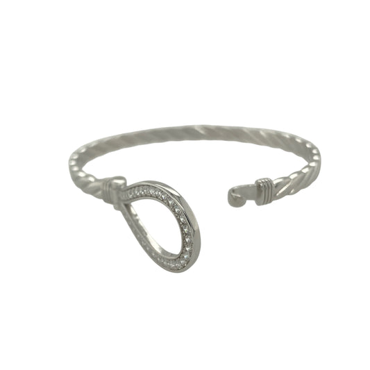 Bring charm and sparkle to your collection with this new 925 silver cubic zirconia children’s horseshoe bangle, a sweet design symbolising luck and happiness.

Design: The bangle features a 15mm high front with a classic horseshoe motif, beautifully accented with sparkling cubic zirconia stones for a touch of brilliance.
Material: Made from solid 925 sterling silver, the polished finish enhances the shine and gives the piece a bright, elegant appearance.
