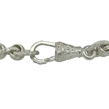 Bring bold design and contemporary style to your collection with this new 925 solid silver patterned rollerball bracelet, a substantial piece with modern appeal.

Design: The bracelet measures 9 inches in length with 9mm wide patterned rollerball links, creating a striking and textured look.
Material: Made from solid 925 sterling silver, the polished finish enhances the intricate detailing of the rollerball links and adds brilliant shine.