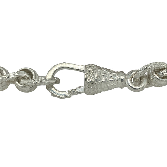 Bring bold design and contemporary style to your collection with this new 925 solid silver patterned rollerball bracelet, a substantial piece with modern appeal.

Design: The bracelet measures 9 inches in length with 9mm wide patterned rollerball links, creating a striking and textured look.
Material: Made from solid 925 sterling silver, the polished finish enhances the intricate detailing of the rollerball links and adds brilliant shine.