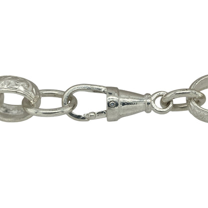 Bring bold sophistication and modern texture to your collection with this new 925 solid silver patterned belcher bracelet, a statement piece with striking detail.

Design: The bracelet measures 9 inches in length with 11mm wide alternating plain and patterned links, creating a distinctive and eye-catching look.
Material: Made from solid 925 sterling silver, the polished finish enhances the contrast between the plain and patterned links for a refined appearance.