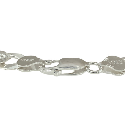 Bring classic design and subtle detail to your collection with this new 925 silver patterned curb bracelet, a timeless piece with a refined modern touch.

Design: The bracelet measures 8.5 inches in length with 9mm wide curb links, each featuring a diamond-cut style pattern in the centre on one side for added sparkle and texture.
Material: Made from solid 925 sterling silver, the polished finish enhances the diamond-cut detailing and gives the bracelet a bright, sophisticated shine.