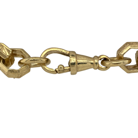 Bring luxurious shine and intricate detail to your collection with this new solid 925 silver heavily 9ct gold plated fancy octagon link bracelet, a bold and beautifully crafted design.

Design: The bracelet measures 8 inches in length with 10mm wide octagon-shaped links featuring detailed patterning, creating a unique and eye-catching style.
Material: Made from solid 925 sterling silver with a heavy layer of 9ct gold plating
