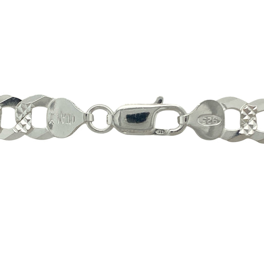 Bring bold shine and refined craftsmanship to your collection with this new 925 silver diamond cut patterned curb chain, a striking design with timeless appeal.

Design: The chain measures 24 inches in length with 9mm wide curb links featuring a diamond-cut pattern in the centre of each link on one side, creating added brilliance and texture.
Material: Made from solid 925 sterling silver, the polished finish enhances the intricate diamond-cut detailing and gives the chain a bright, eye-catching shine.