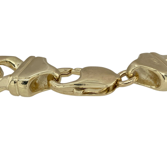 Bring bold sophistication and timeless strength to your collection with this pre-owned 9ct yellow solid gold curb bracelet, combining classic design with a luxurious finish—perfect for making a statement on any occasion.

Design: The bracelet features a traditional curb link style with substantial 15mm wide links, offering a smooth, polished look that reflects light beautifully for a striking presence.