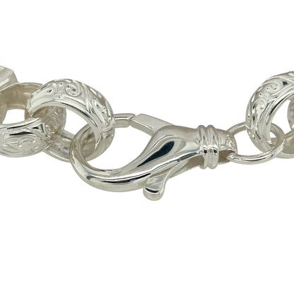 Bring striking brilliance and luxurious presence to your collection with this new 925 silver cubic zirconia 9.5" patterned gypsy-style link bracelet, combining bold design with refined sparkle—perfect for statement occasions or elevated everyday wear.

Design: The bracelet features a wide gypsy-style patterned link design, each link measuring 15mm across and adorned with glittering cubic zirconias for maximum radiance and texture.