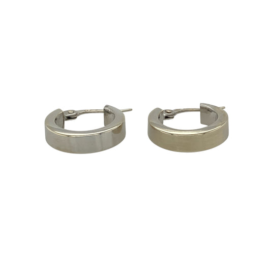 Bring sleek simplicity and modern elegance to your collection with these pre-owned 9ct white gold small plain hoop creole earrings, combining timeless design with a polished contemporary finish—perfect for everyday wear or subtle sophistication.

Design: Each earring features a small, classic creole hoop design with smooth, clean lines for a minimalist and refined look.