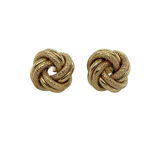 Bring timeless elegance and intricate detail to your collection with these pre-owned 9ct yellow gold patterned knot stud earrings—perfect for both everyday wear and special occasions.

Design: Each earring showcases a beautiful knot design measuring 13mm, symbolising unity and strength. The intricate patterning adds depth and texture, creating a refined and eye-catching finish.