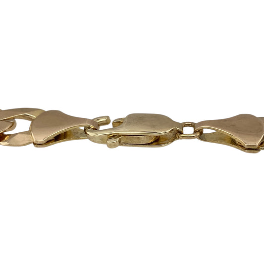 Bring bold sophistication and timeless appeal to your collection with this pre-owned 9ct yellow gold curb bracelet—perfect for making a confident statement in classic style.

Design: The bracelet features a traditional curb link design with 10mm-wide links, offering a smooth, polished finish that reflects light beautifully for maximum shine and presence.
Material: Made from 9-carat yellow gold, the rich tone enhances the bold styling and ensures lasting quality and durability.