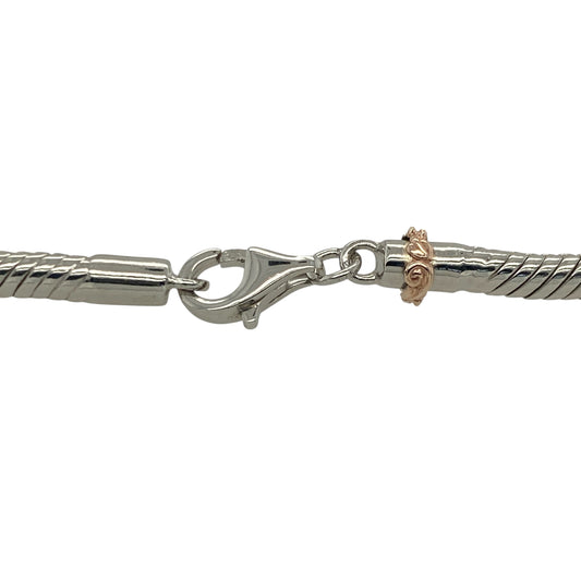 Bring timeless style and versatile elegance to your collection with this pre-owned 925 silver and 9ct rose gold Clogau bead charm bracelet—perfect for personalising with your favourite charms or wearing as a classic statement piece.

Design: The bracelet features a polished bead-style design that offers both strength and flexibility, finished with Clogau’s signature 9ct rose gold detailing for a touch of warmth and sophistication.