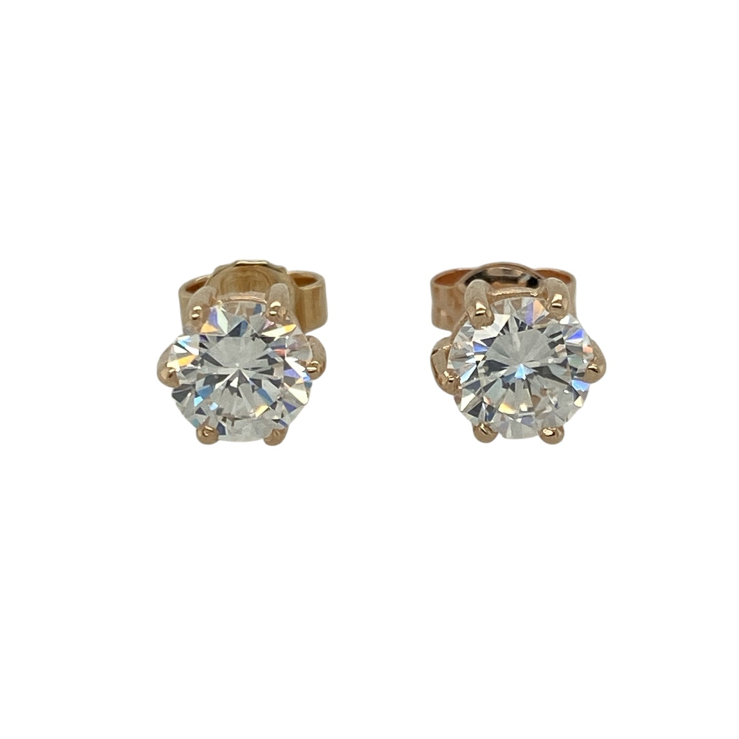 Add radiant sparkle and timeless elegance to your collection with these pre-owned 9ct yellow gold and cubic zirconia round stud earrings — a classic design that offers brilliant shine and everyday sophistication.

Design: Each earring features a 6mm round-cut cubic zirconia stone set in a polished gold setting, creating a simple yet striking look that captures the light beautifully.