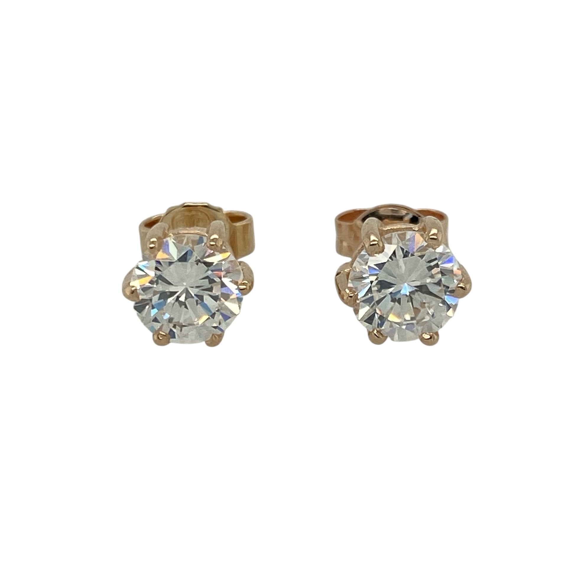 Add radiant sparkle and timeless elegance to your collection with these pre-owned 9ct yellow gold and cubic zirconia round stud earrings — a classic design that offers brilliant shine and everyday sophistication.

Design: Each earring features a 6mm round-cut cubic zirconia stone set in a polished gold setting, creating a simple yet striking look that captures the light beautifully.