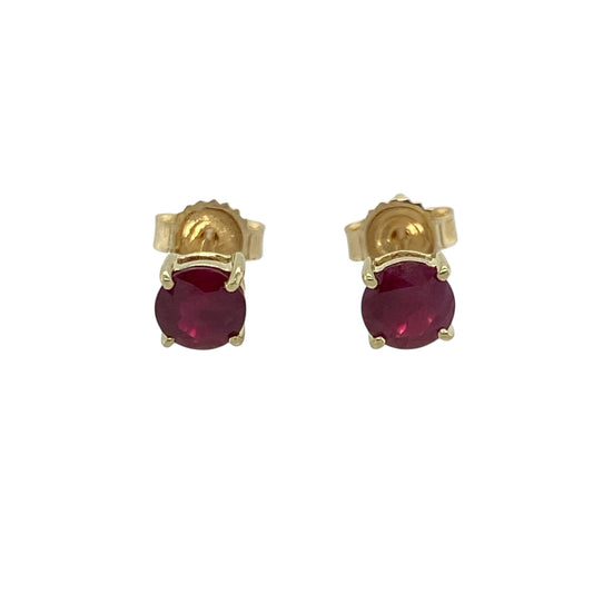 Add a touch of rich colour and timeless elegance to your collection with these pre-owned 9ct yellow gold and ruby set round stud earrings — a classic design that radiates refined beauty.

Design: Each earring features a 4mm round-cut ruby, displaying deep red tones that symbolise love and passion, set in a polished gold surround for a sleek and elegant look.
Material: Made from 9-carat yellow gold, the warm golden tone enhances the vibrant colour of the rubies and provides a luxurious, polished finish.