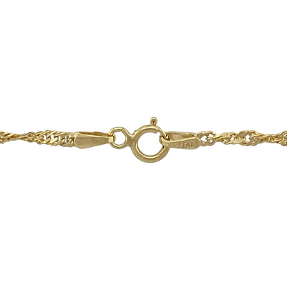 Add a touch of elegant sparkle to your look with this pre-owned 9ct yellow gold Singapore chain, known for its graceful twist and fluid movement—perfect for everyday wear or subtle sophistication.

Design: The chain features a delicate twisted link pattern that reflects light beautifully, giving it a refined shimmer from every angle.
Material: Made from 9-carat yellow gold, offering a warm hue and polished finish that complements any style.