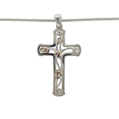 Celebrate faith and natural beauty with this pre-owned 925 silver and 9ct rose gold Clogau Tree of Life cross pendant necklace, blending spiritual symbolism with elegant craftsmanship—perfect for meaningful everyday wear or special occasions.

Design: The pendant features Clogau’s iconic Tree of Life motif within a graceful cross design, symbolising growth, strength, and eternal connection. The pendant measures 4.2cm long including the bail, creating a refined and balanced look.