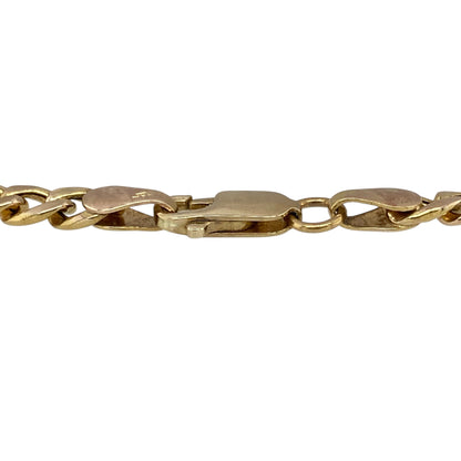 Bring classic style and everyday elegance to your collection with this pre-owned 9ct yellow gold 7.5" hollow curb bracelet—a timeless piece that complements any look.

Design: The bracelet features traditional curb links measuring 4mm in width, offering a sleek and polished appearance that reflects light beautifully.
Material: Made from 9-carat yellow gold, the warm tone and high-shine finish give the bracelet a refined and versatile appeal.