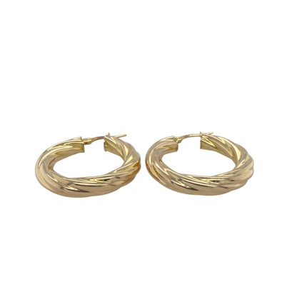 Add timeless elegance and graceful movement to your collection with these pre-owned 9ct yellow gold twisted hoop creole earrings, offering classic style with a refined twist—perfect for everyday wear or special occasions.

Design: Each earring features a beautifully twisted hoop design that reflects light from every angle, adding depth and subtle sparkle to a traditional silhouette.
