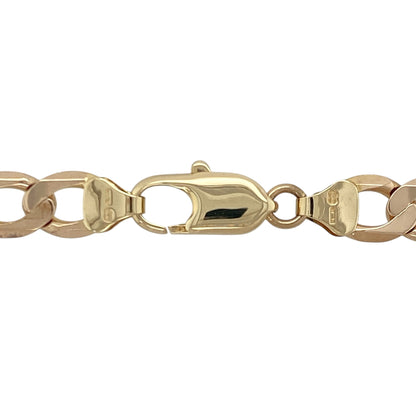 Bring bold shine and impressive presence to your collection with this pre-owned 9ct yellow gold curb chain—an eye-catching piece offering timeless style and substantial weight.

Design: This 20" curb chain features wide 8mm flat links, creating a strong, confident profile with a smooth and stylish drape.
Material: Made from 9-carat yellow gold, the chain displays a polished, radiant finish that enhances its rich golden tone.