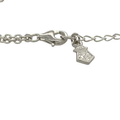 Bring symbolic beauty and delicate charm to your jewellery collection with this pre-owned 925 silver and 9ct rose gold Clogau daffodil bracelet — a graceful piece inspired by the national flower of Wales.

Design: The bracelet features a detailed daffodil motif in warm rose gold, paired with a fine silver chain for a light and elegant look.
Material: Made from 925 silver with 9ct rose gold detailing, the two-tone finish enhances the floral design and reflects classic Clogau styling.