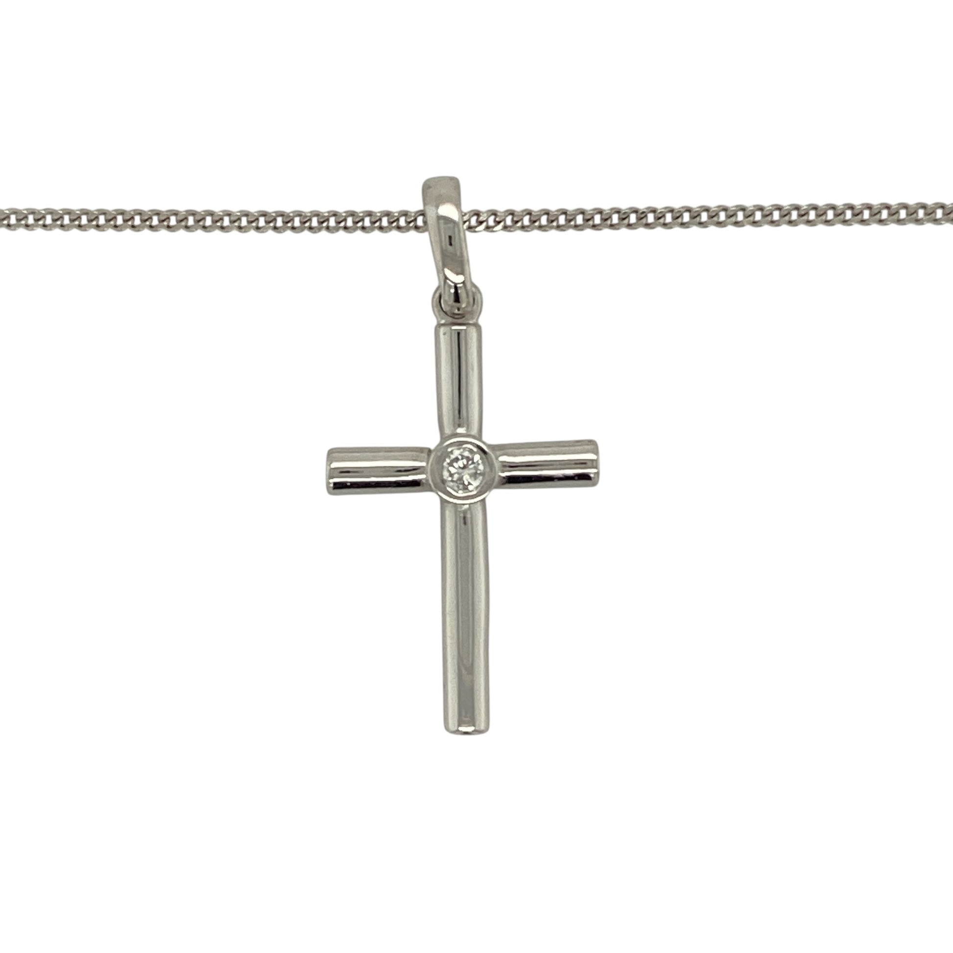 Bring classic sparkle and modern elegance to your collection with this pre-owned 9ct white gold diamond set cross pendant necklace—an uplifting piece with timeless appeal and refined detail.

Design: The pendant measures 3.3cm long including the bail and features a sleek cross design accented with diamonds that add bright, subtle brilliance. Its elongated silhouette and polished finish create a graceful and contemporary look.