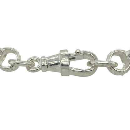 Bring romantic charm and modern shine to your jewellery collection with this new 925 silver & pink stone set double heart belcher bracelet, offering eye-catching design with a quality feel.

Design: The bracelet features a patterned belcher link design, finished with two interlinked heart motifs set with pink stones for a sweet and elegant focal point.
Material: Made from solid 925 sterling silver, the polished finish provides bright shine and lasting durability.