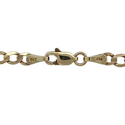 Bring timeless style and everyday wearability to your jewellery collection with this pre-owned 9ct yellow gold curb chain, a classic design that offers versatility and enduring appeal.

Design: The chain features a traditional curb link style with flat, closely interlocking links that sit smoothly against the neckline. With an approximate link width of 3mm, it provides a balanced and understated look suitable for daily wear.