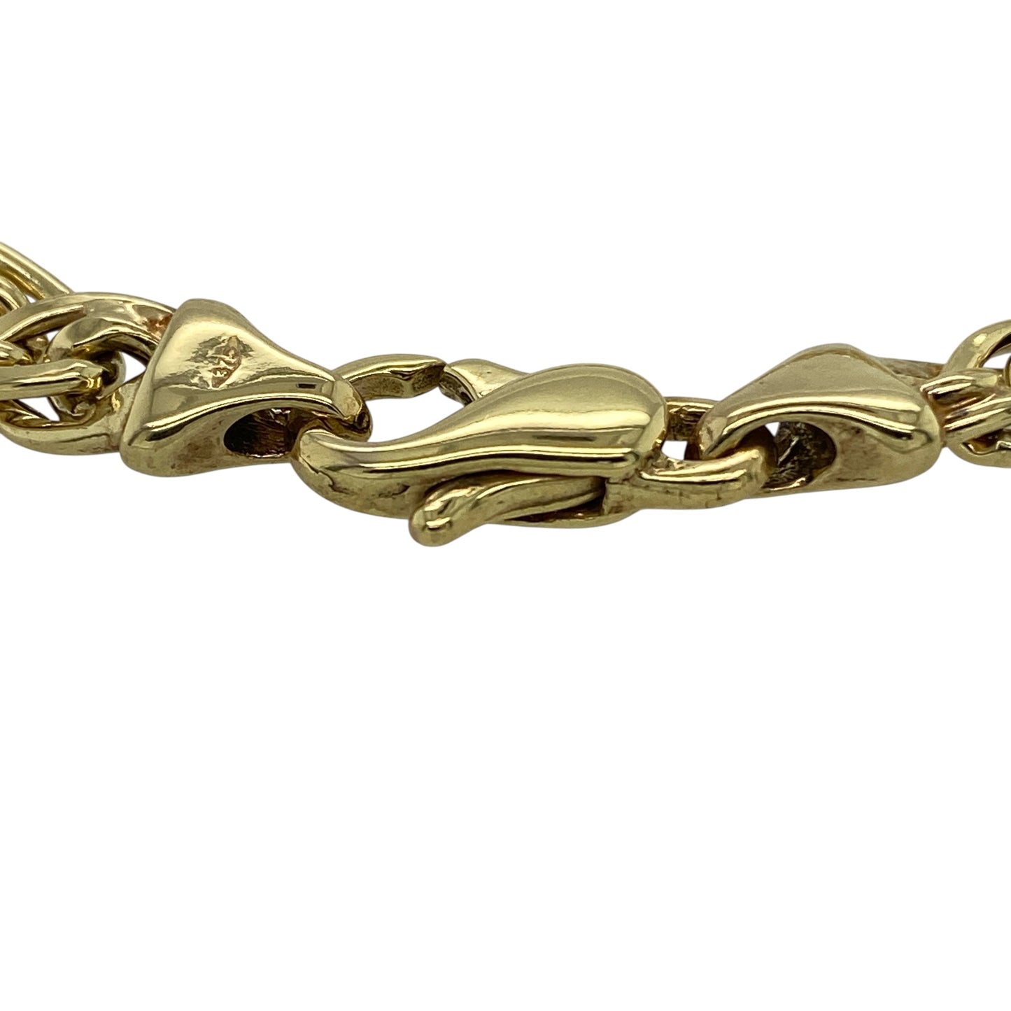 Bring bold texture and classic gold style to your jewellery collection with this pre-owned 9ct yellow gold double curb link bracelet, a timeless piece with strong presence and everyday versatility.

Design: The bracelet features a traditional double curb link design, creating a layered and substantial look with closely interlocking links. With an approximate link width of 7mm, it offers a confident and eye-catching profile on the wrist.