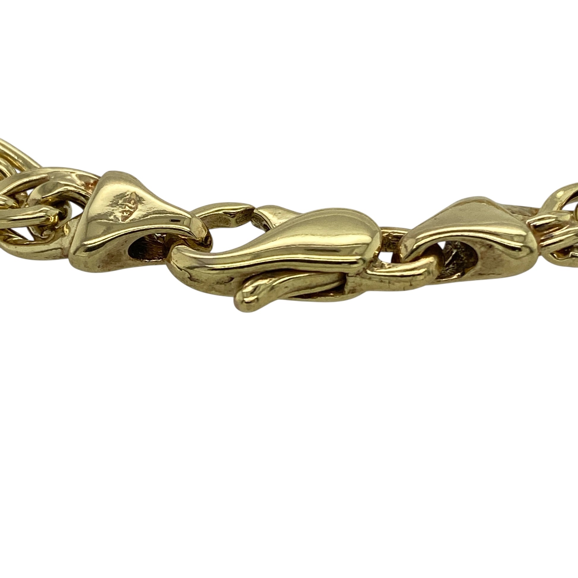 Bring bold texture and classic gold style to your jewellery collection with this pre-owned 9ct yellow gold double curb link bracelet, a timeless piece with strong presence and everyday versatility.

Design: The bracelet features a traditional double curb link design, creating a layered and substantial look with closely interlocking links. With an approximate link width of 7mm, it offers a confident and eye-catching profile on the wrist.