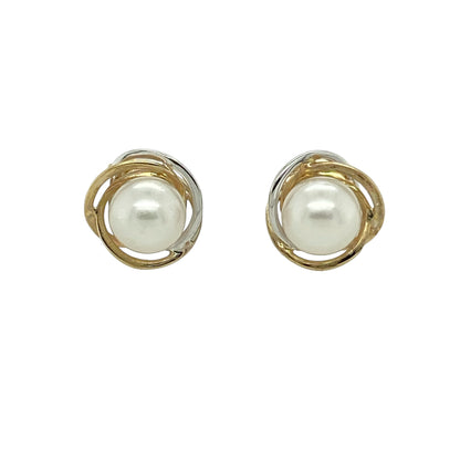 Bring soft elegance and timeless charm to your jewellery collection with these pre-owned 9ct yellow and white gold pearl set stud earrings, a classic design that pairs gentle lustre with refined contrast.

Design: Each stud features a round pearl measuring approximately 5mm in diameter, offering a delicate and understated focal point.
Material: Made from a combination of 9-carat yellow and white gold, the contrasting tones add subtle depth and a polished finish.