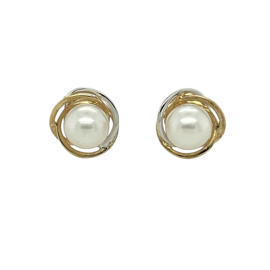 Bring soft elegance and timeless charm to your jewellery collection with these pre-owned 9ct yellow and white gold pearl set stud earrings, a classic design that pairs gentle lustre with refined contrast.

Design: Each stud features a round pearl measuring approximately 5mm in diameter, offering a delicate and understated focal point.
Material: Made from a combination of 9-carat yellow and white gold, the contrasting tones add subtle depth and a polished finish.