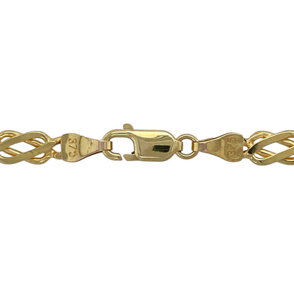 Bring heritage-inspired style and enduring elegance to your jewellery collection with this pre-owned 9ct yellow gold Celtic knot chain, a distinctive design rooted in tradition and timeless appeal.

Design: The chain features interlinked Celtic knot-style links with a width of approximately 4mm, creating a bold and intricately detailed look.
Material: Made from polished 9-carat yellow gold, the warm golden tone highlights the depth and character of the Celtic-inspired pattern.