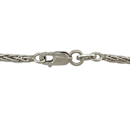 Bring refined texture and timeless elegance to your jewellery collection with this pre-owned 9ct white gold spiga chain, a classic piece with distinctive detail.

Design: This chain features the traditional spiga (wheat) link pattern, creating a beautifully woven look with subtle texture and strength.
Material: Made from 9-carat white gold, the bright polished finish enhances the intricate link design and offers a modern, versatile appeal.