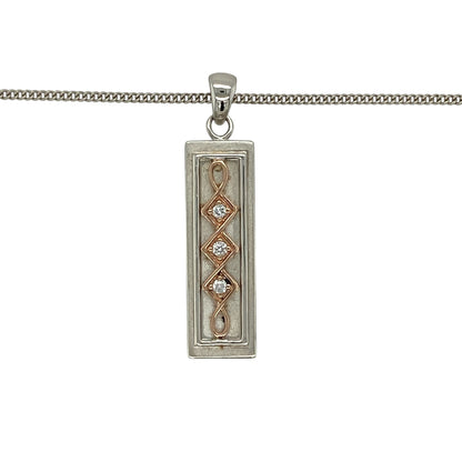 Bring refined simplicity and signature Welsh style to your jewellery collection with this pre-owned 925 silver diamond set Clogau ingot pendant necklace.

Design: The pendant features a sleek ingot-style design accented with a subtle diamond, measuring approximately 3.3cm in length including the bail for a clean and contemporary look.
Material: Made from sterling silver, the polished finish highlights the minimalist ingot form while allowing the diamond detail to add a touch of refined sparkle.