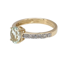 Load image into Gallery viewer, Preowned 9ct Yellow and White Gold Diamond &amp; Aqua Coloured Set Ring in size L with the weight 1.90 grams. The aqua coloured stone is 7mm by 5mm
