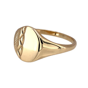 Preowned 9ct Yellow Gold Engraved Oval Signet Ring in size W with the weight 3.90 grams. The front of the ring is 13mm high