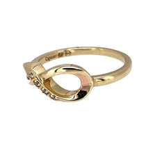 Load image into Gallery viewer, Preowned 9ct Yellow and Rose Gold &amp; Diamond Set Clogau Infinity Symbol Ring in size N with the weight 2.70 grams. The widest part of the infinity symbol is 7mm wide
