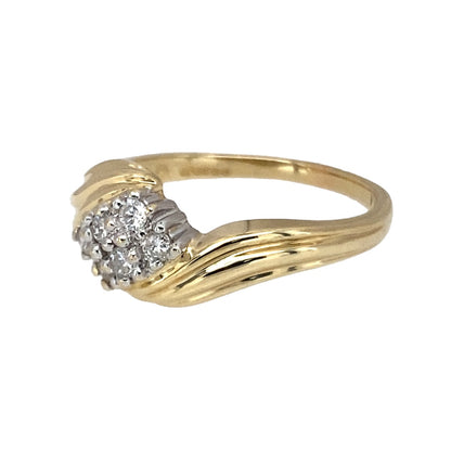 Preowned 9ct Yellow and White Gold & Diamond Set Twist Cluster Ring in size N to O with the weight 2.40 grams. The front of the ring is 9mm high