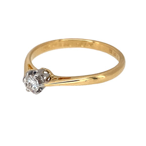 Preowned 18ct Yellow Gold & Platinum Diamond Set Solitaire Ring in size M with the weight 1.90 grams. The diamond is approximately 15pt with approximate clarity Si and colour J - L