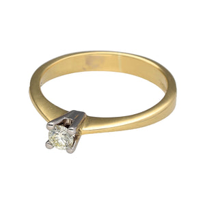 Preowned 18ct Yellow and White Gold & Diamond Set Solitaire Ring in size L with the weight 2.90 grams. The diamond is approximately 17pt with approximate clarity VS2 and colour M - N