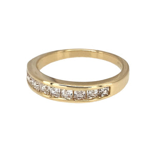 Preowned 14ct Yellow Gold & Cubic Zirconia Set Band Ring in size K with the weight 2.30 grams. The front of the band is 4mm wide