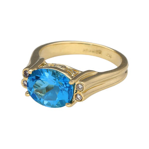 Preowned 14ct Yellow Gold Diamond & Blue Topaz Set Dress Ring in size M with the weight 6.30 grams. The blue topaz stone is 10mm by 8mm