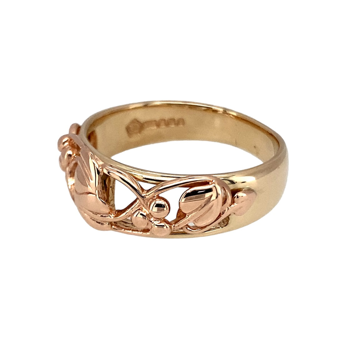 Preowned 9ct Yellow and Rose Gold Clogau Tree of Life Ring in size T with the weight 5.20 grams. The front of the band is 8mm wide