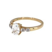 Load image into Gallery viewer, Preowned 10ct Yellow and White Gold &amp; Cubic Zirconia Set Solitaire Ring in size P to Q with the weight 1.90 grams. The center stone is 7mm by 5mm
