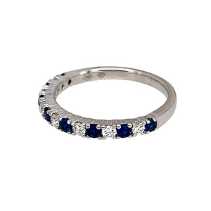 Preowned 18ct White Gold Diamond & Sapphire Set Band Ring in size M with the weight 2.60 grams. The sapphire stone is approximately 2mm diameter
