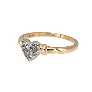 Preowned 9ct Yellow and White Gold & Diamond Set Heart Ring in size M with the weight 1.50 grams. There is approximately 10pt of diamond content and the front of the ring is 6mm high