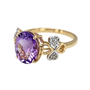 Preowned 10ct Yellow and White Gold Amethyst & Cubic Zirconia Set Ring in size S with the weight 3.60 grams. The amethyst stone is 11mm by 9mm